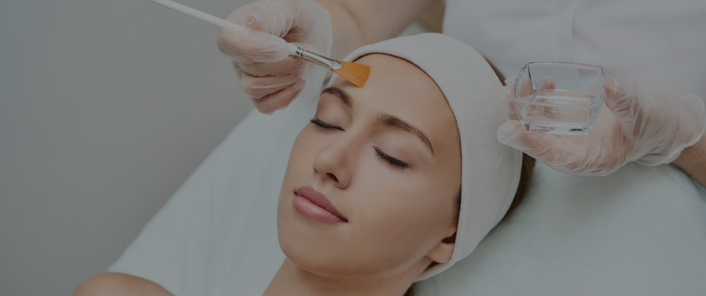 Woman receiving medical grade peel treatment